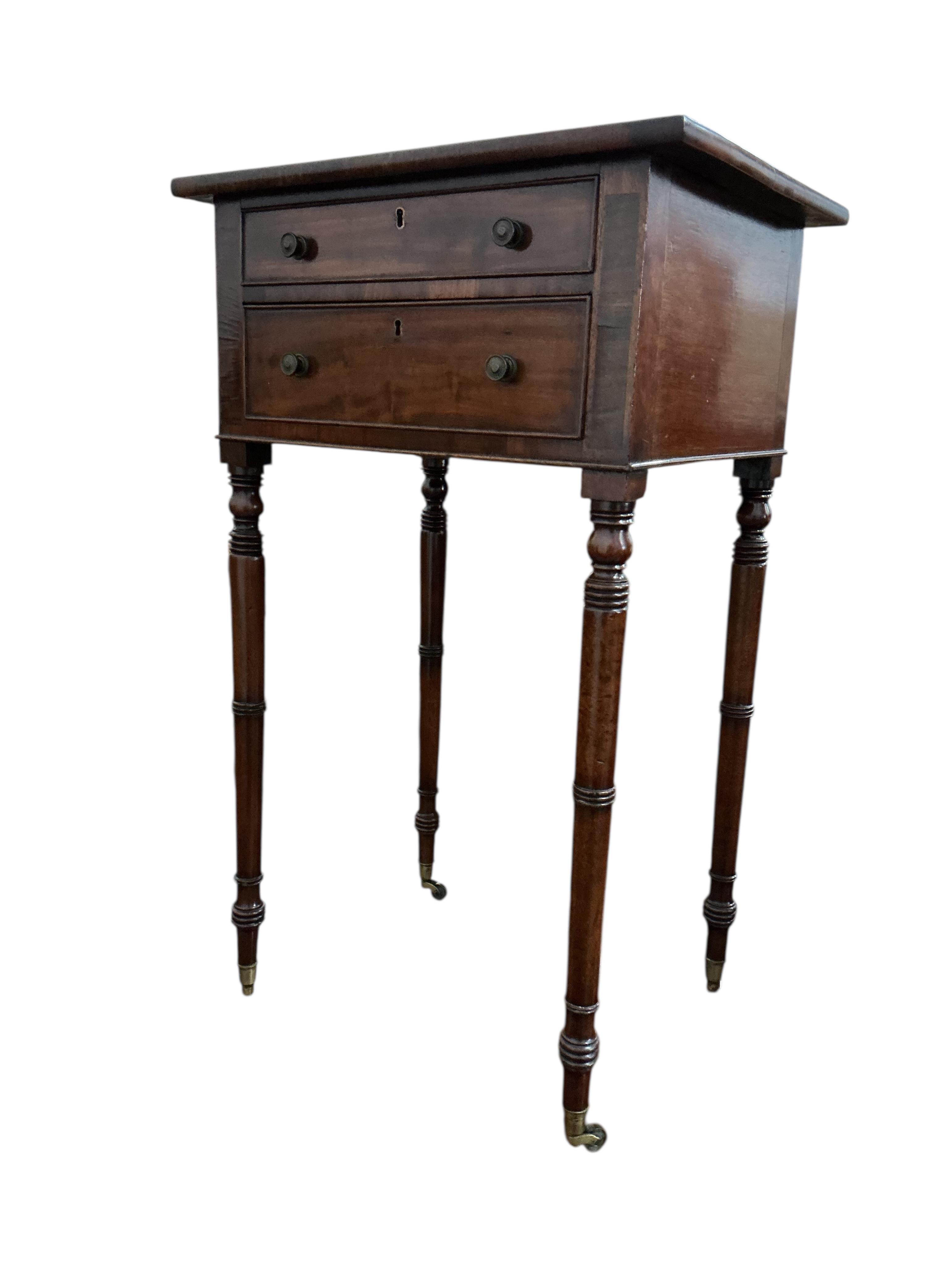 A Regency mahogany two drawer work table, width 47cm, depth 36cm, height 78cm